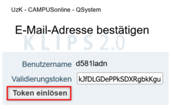 View of the Confirm Email Address page. The Redeem Token button is highlighted.
